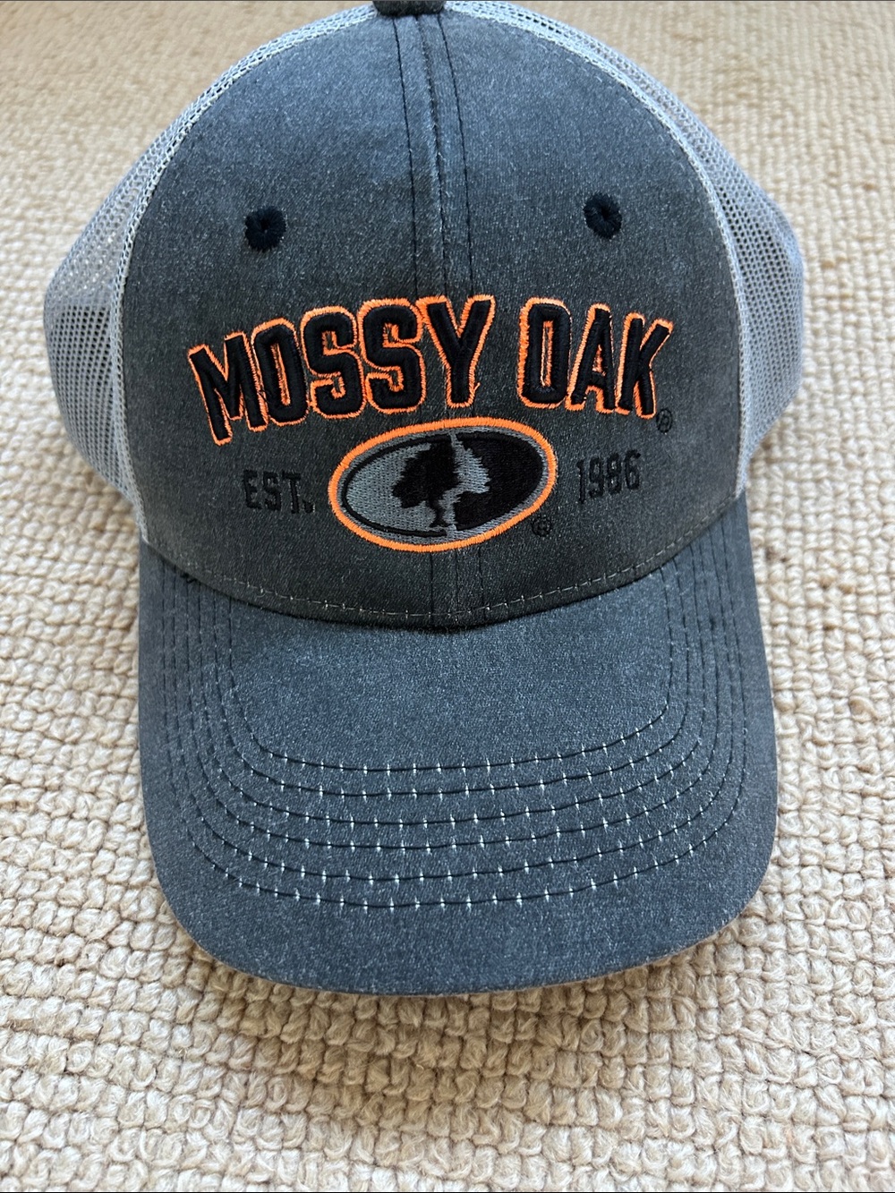 Mossy Oak Gray and Orange Logo Trucker Hat